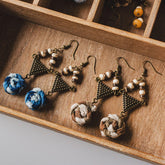 Elegant Handmade Tie-Dye Flower Earrings with Geometric Triangle Charms